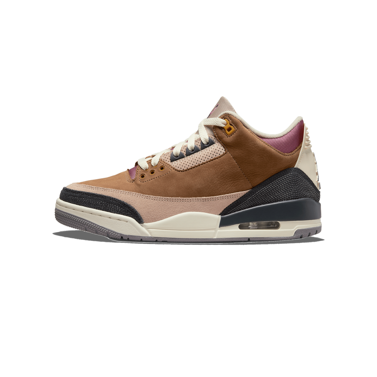 Side profile of a single brown Air Jordan 3 sneaker with a toe pointing left, showing tan suede overlays, black heel and toe accents, cream midsole with a visible Air unit, and burgundy lining at the collar.