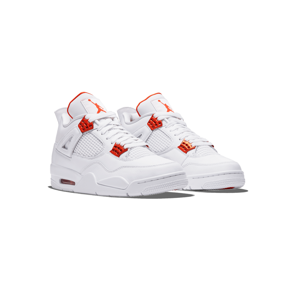 A pair of white Air Jordan 4 sneakers with metallic orange eyelet tabs, orange Jumpman logos on the tongues, and orange accents at the collar, shown side by side angled toward the left on a white background.