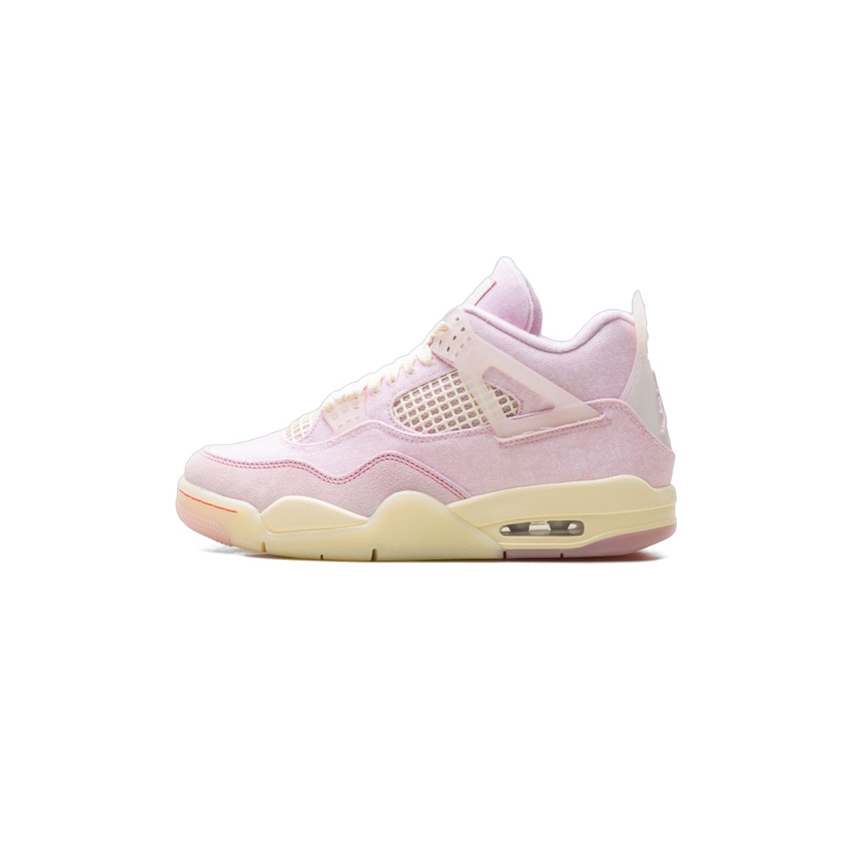 Side view of a pink denim Air Jordan 4 Retro sneaker with mesh side panels, translucent wing eyelets, and an off-white midsole and laces.