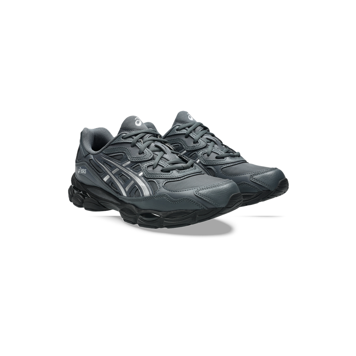 Pair of gray Asics Gel-NYC sneakers with black soles and silver logo detailing, shown at a three-quarter angle facing forward.