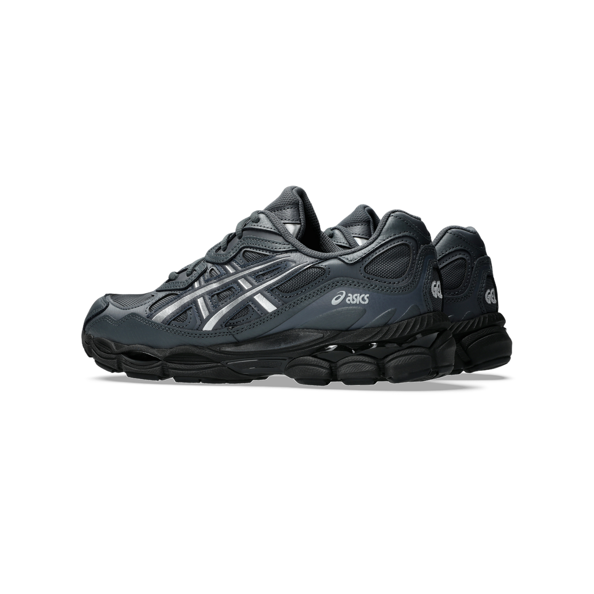 Side view of a pair of gray and black Asics Gel-NYC sneakers with a chunky black outsole and silver overlay accents.