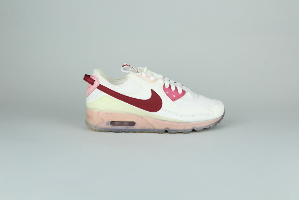 Nike Air Max 90 Terrascape Pomegranate sneakers side view, vibrant red and orange accents, eco-friendly design, vintage running shoe, innovative athletic footwear