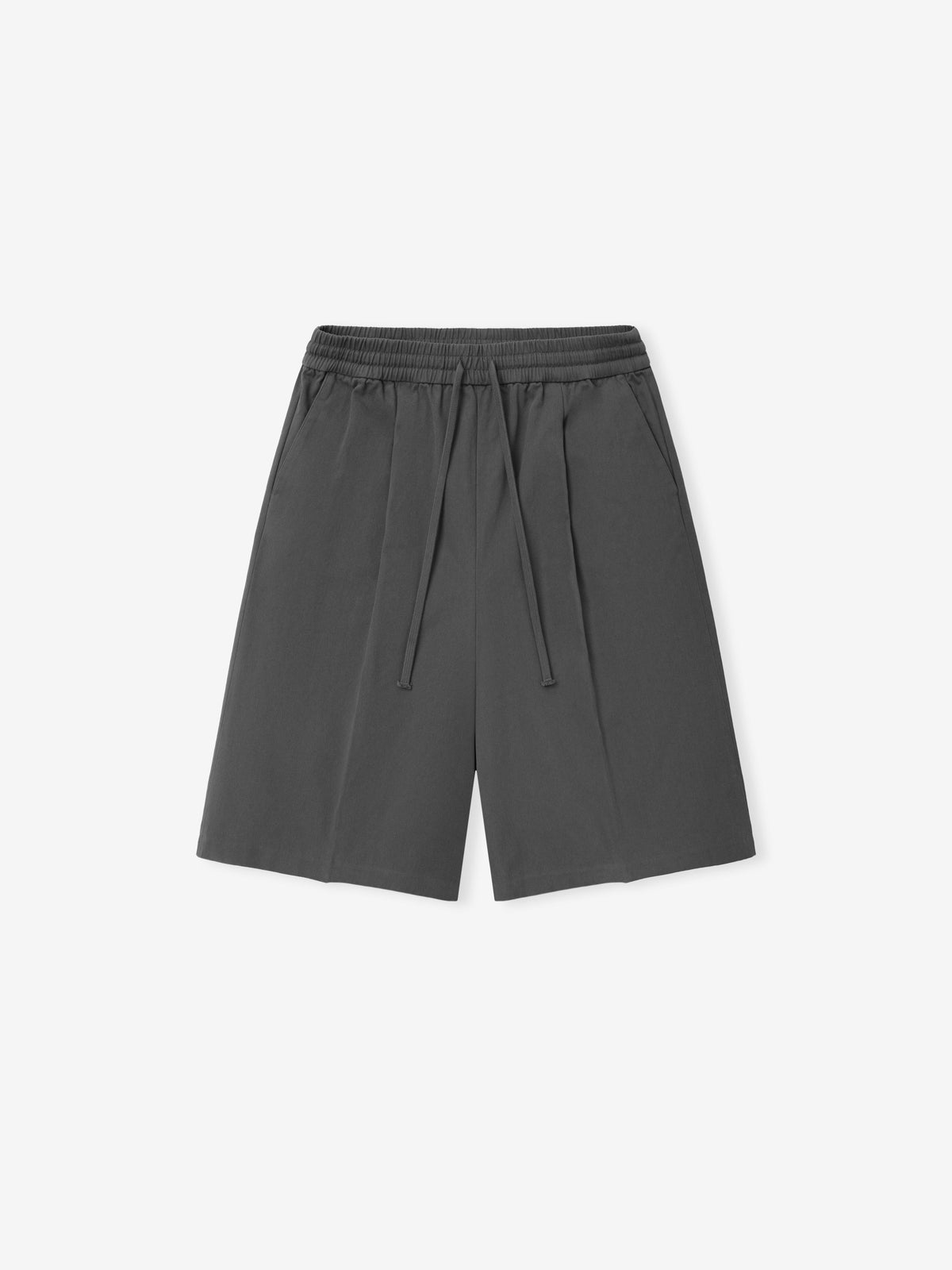 Front view of gray Fear of God Essentials relaxed drawstring shorts with an elastic waistband and side pockets, laid flat.