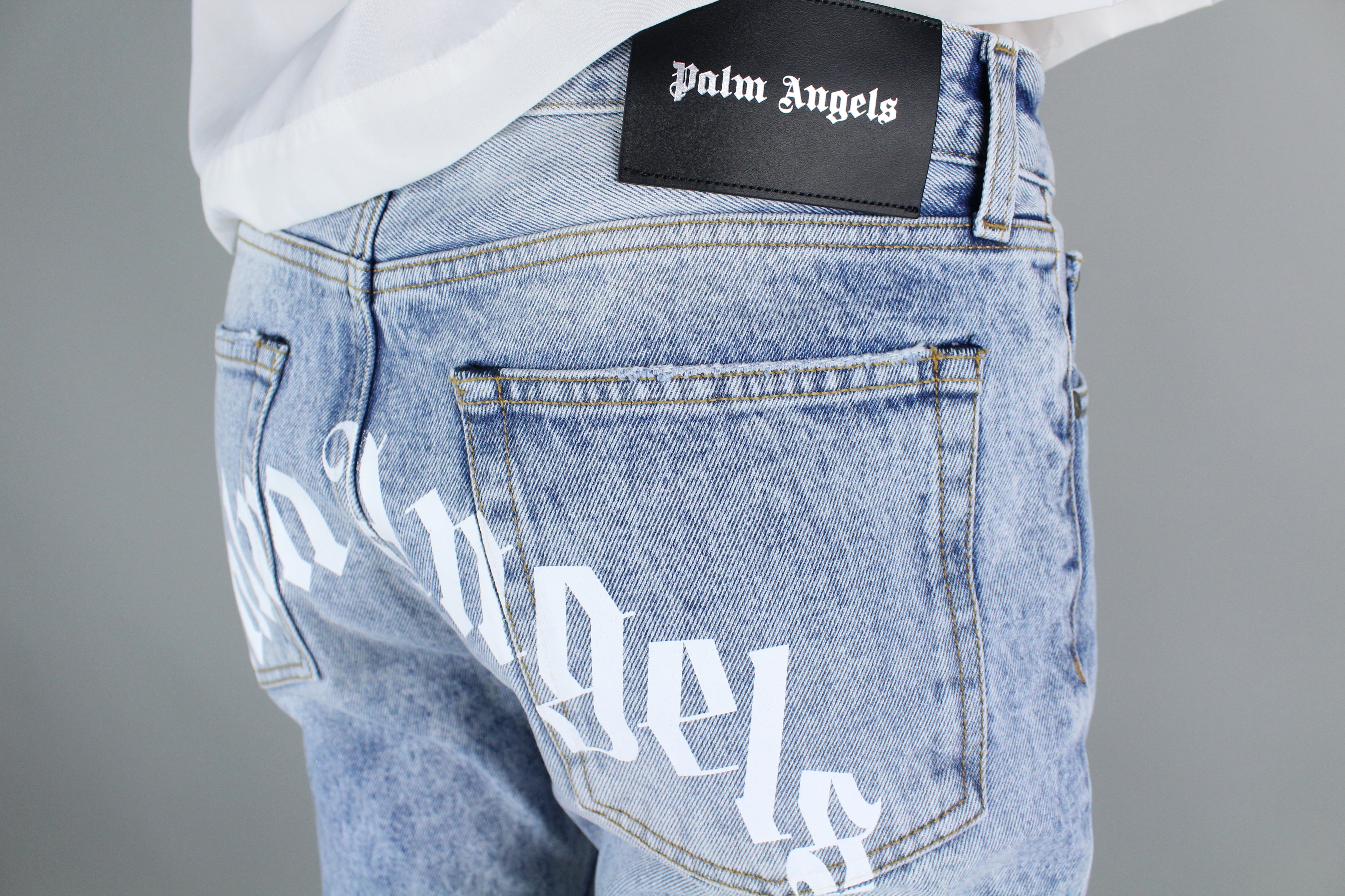 Palm Angels Curved Logo Print Straight Fit Jeans (Light Blue)-8435696730442-The Attic