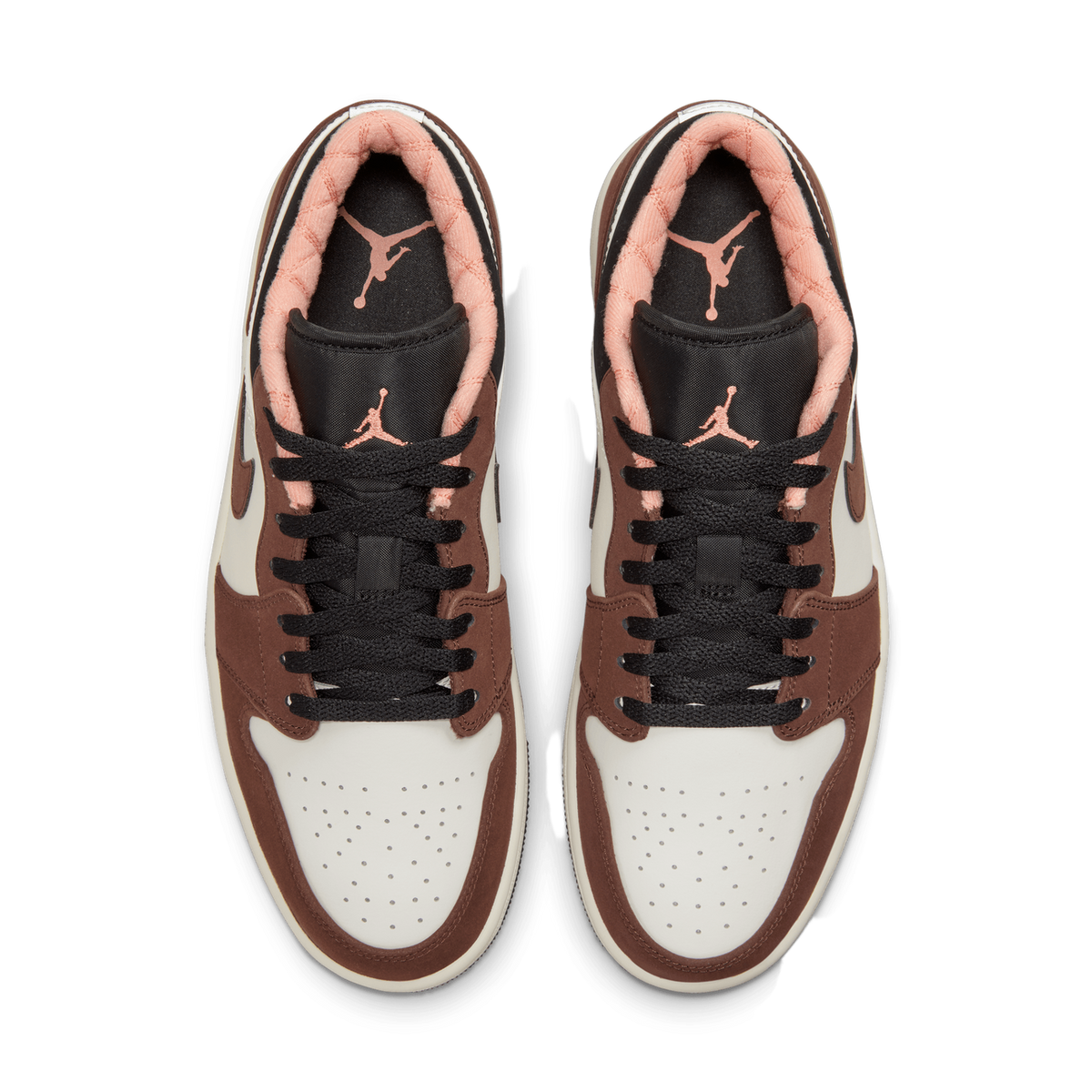 Top-down view of a pair of brown and white Air Jordan 1 Low sneakers with black laces and peach-colored Jumpman logos on the tongues