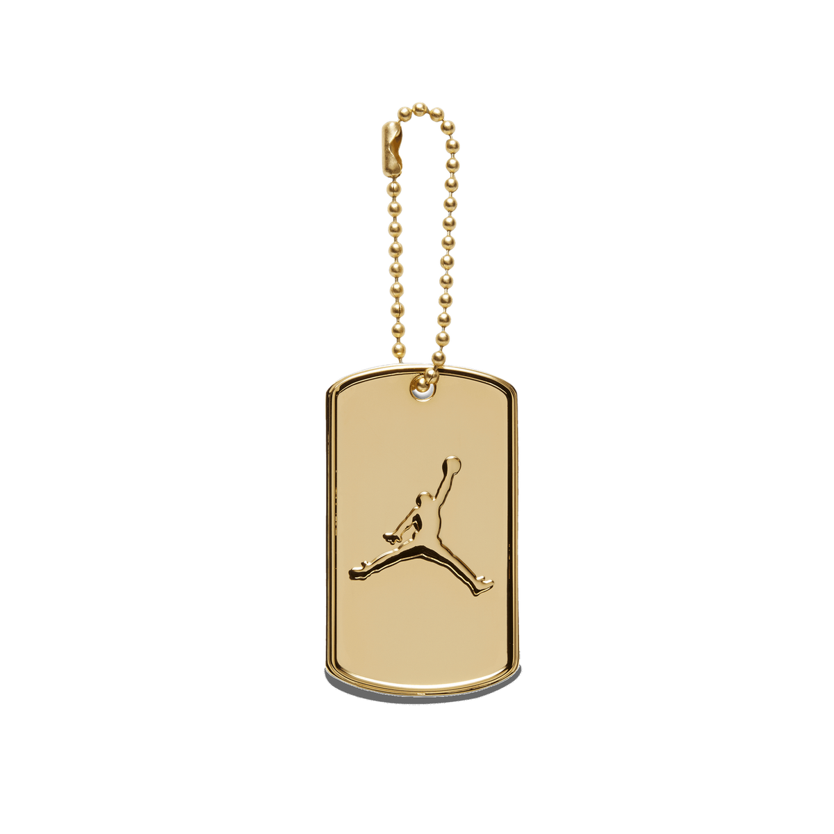Gold-toned dog tag keychain with an embossed Jumpman logo, attached to a ball chain, shown against a white background.