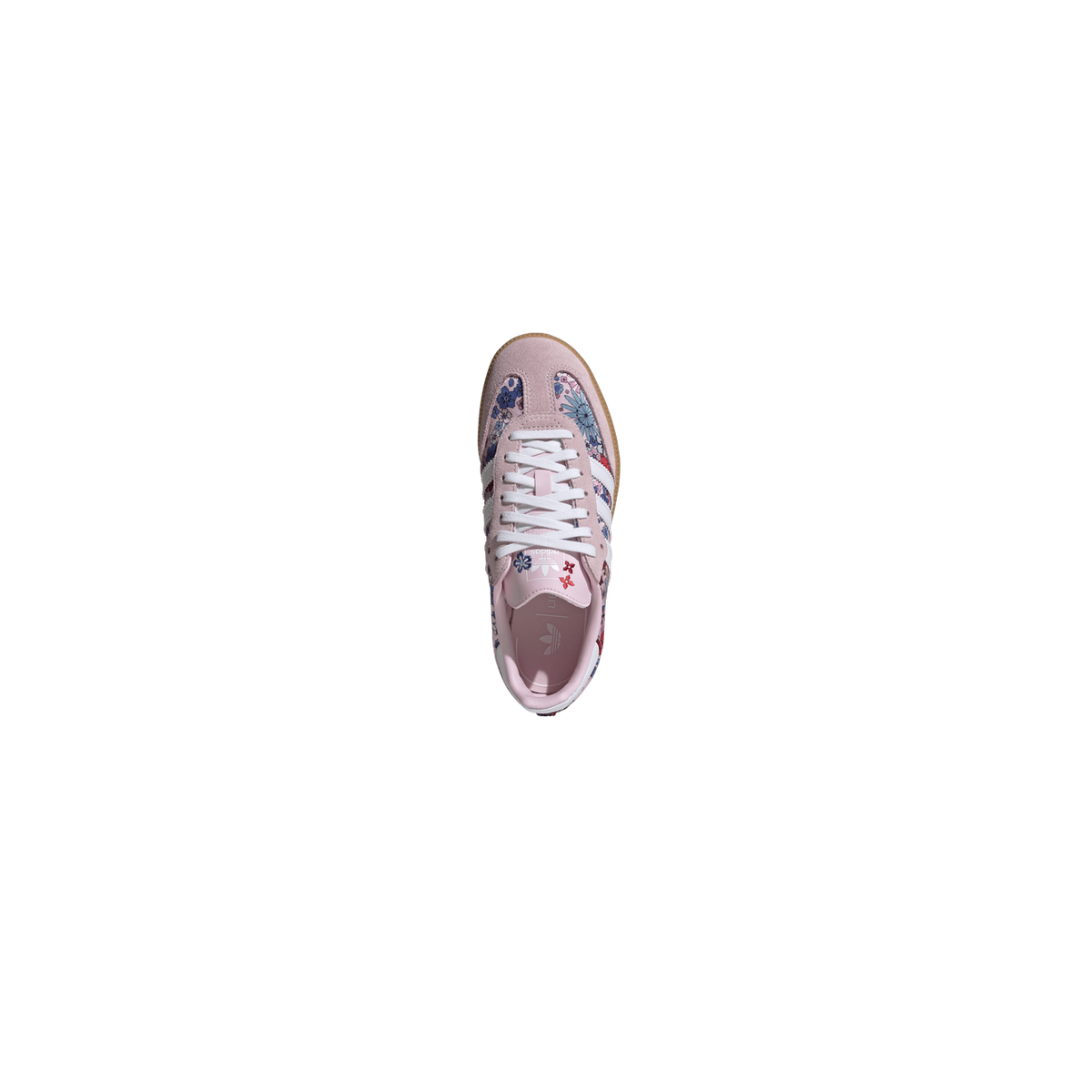 Top-down view of a pink Adidas Samba sneaker with white laces, white stripes, floral print panels, and a pink insole with the adidas trefoil logo