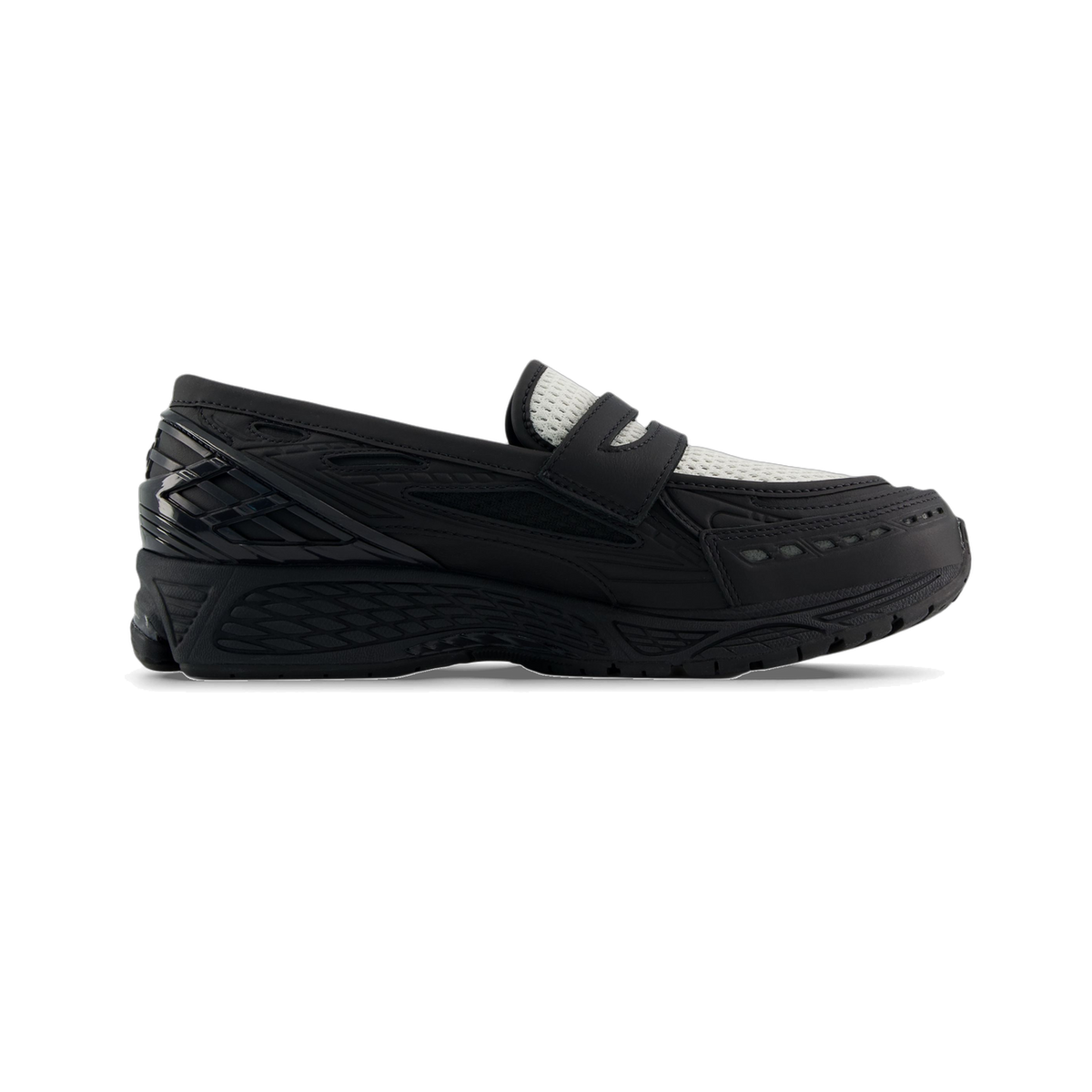 Side view of a black New Balance 1906L hybrid loafer-sneaker with a gray mesh vamp, black leather strap, and chunky black sculpted sole.