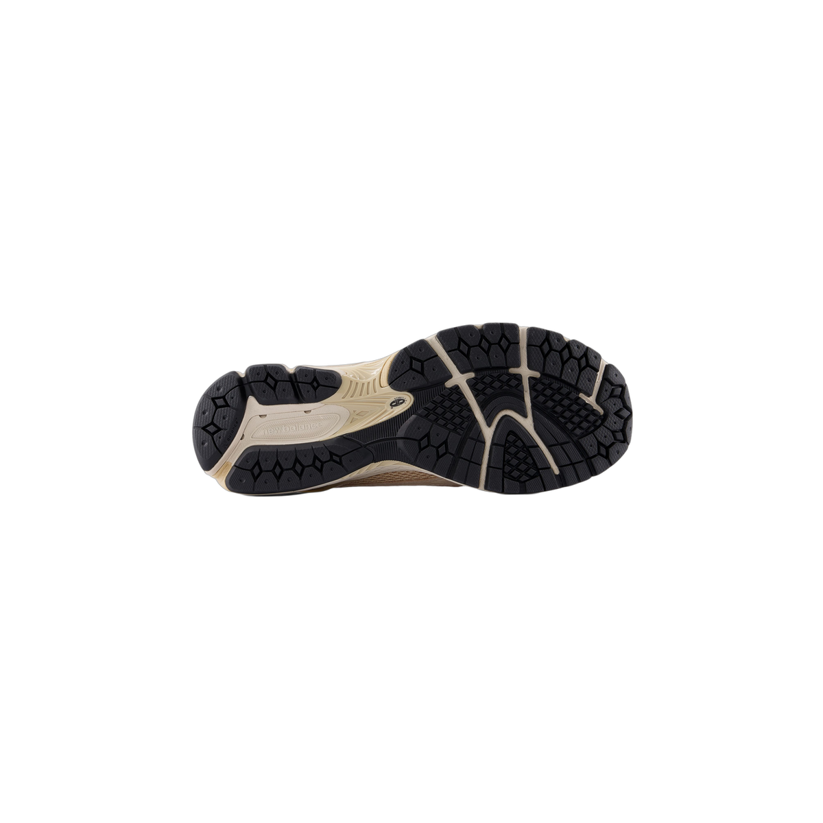 Bottom view of a New Balance 1906L sneaker showing the beige and black tread pattern outsole with New Balance logo imprinted near the heel