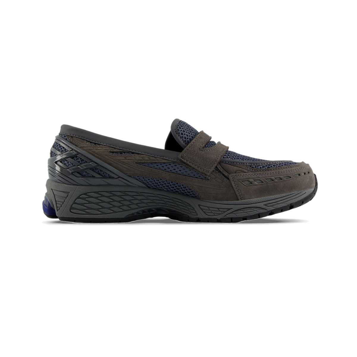 Side view of a gray New Balance 1906L hybrid loafer-sneaker with navy mesh panels, suede overlays, and a chunky textured sole.