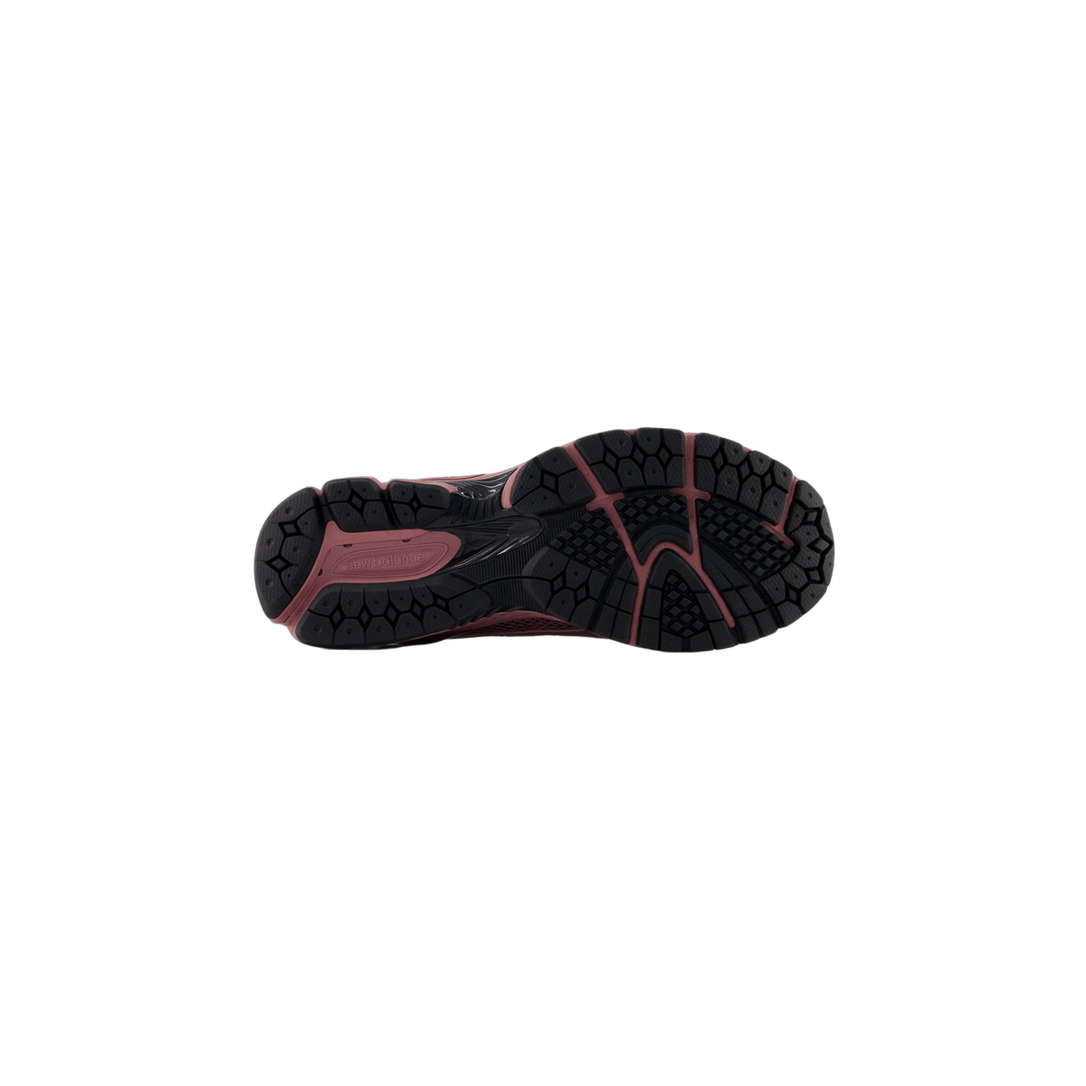 Bottom view of a New Balance 1906L sneaker showing a black lugged outsole with rosewood pink accents and the New Balance logo on the heel.