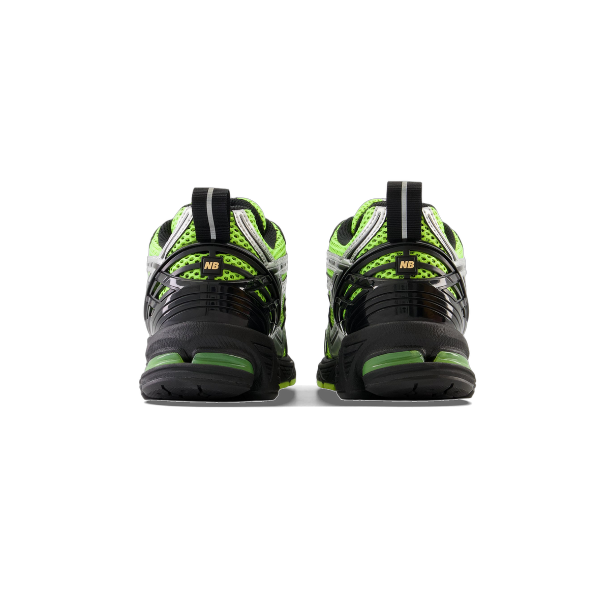 Rear view of a pair of New Balance 1906R sneakers in black and volt green with a black heel clip bearing an NB logo and black outsoles
