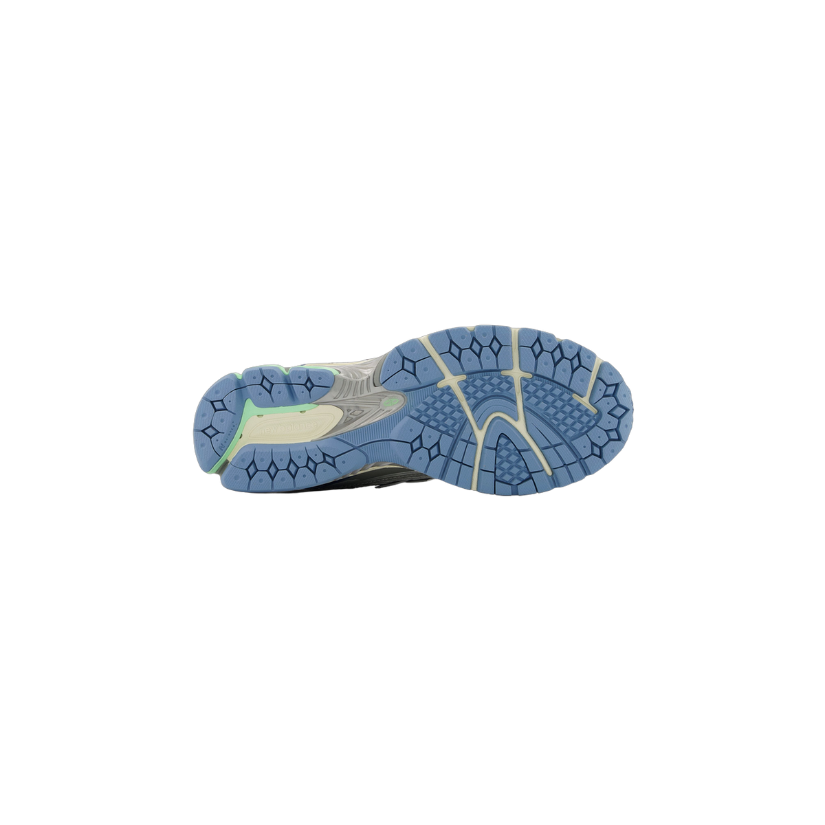 Bottom view of a New Balance 1906 sneaker showing a blue lug-pattern outsole with green and cream accents