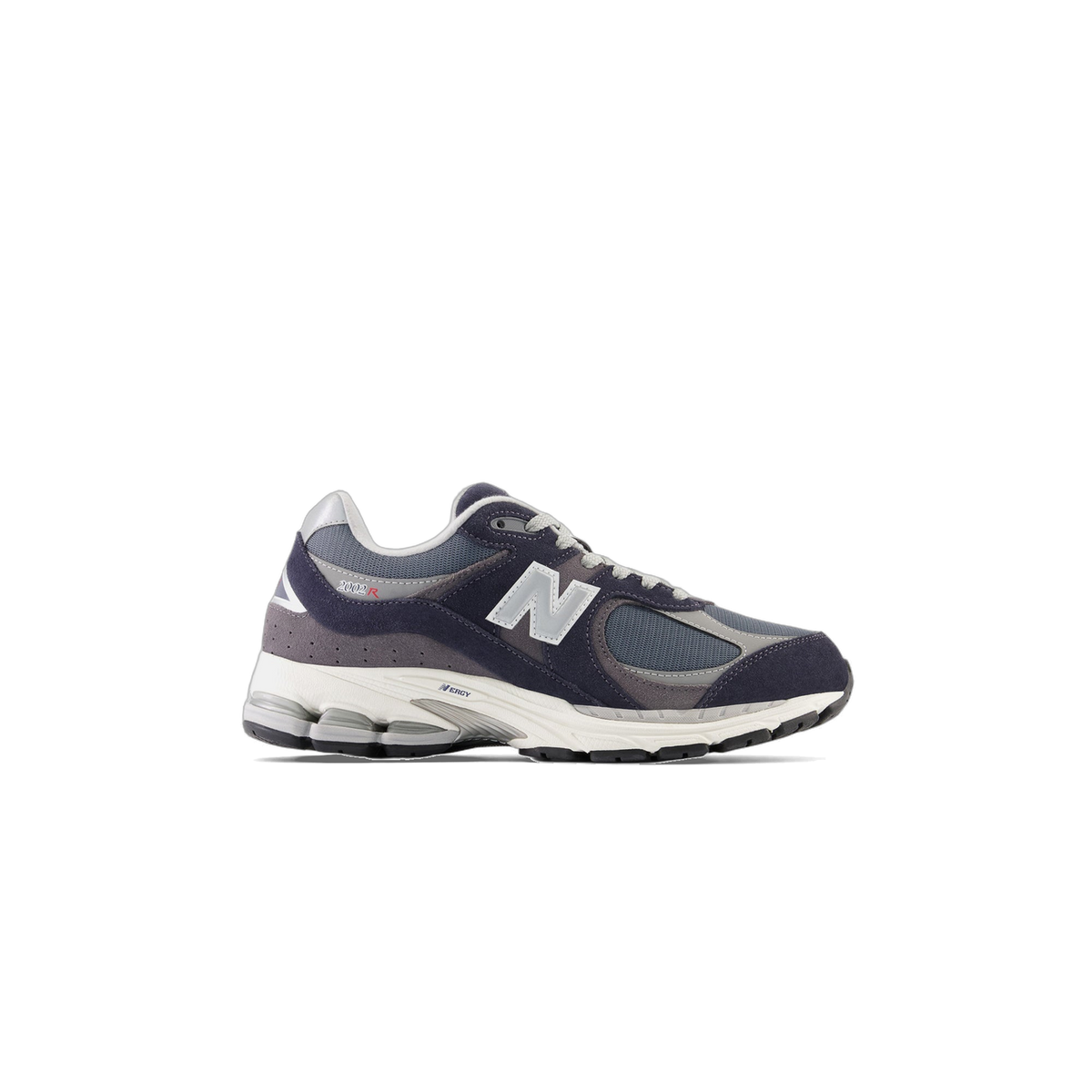 Side view of a navy and gray New Balance 2002R sneaker with a white N logo, white laces, and a white midsole with visible foam cushioning elements, toe pointing left.