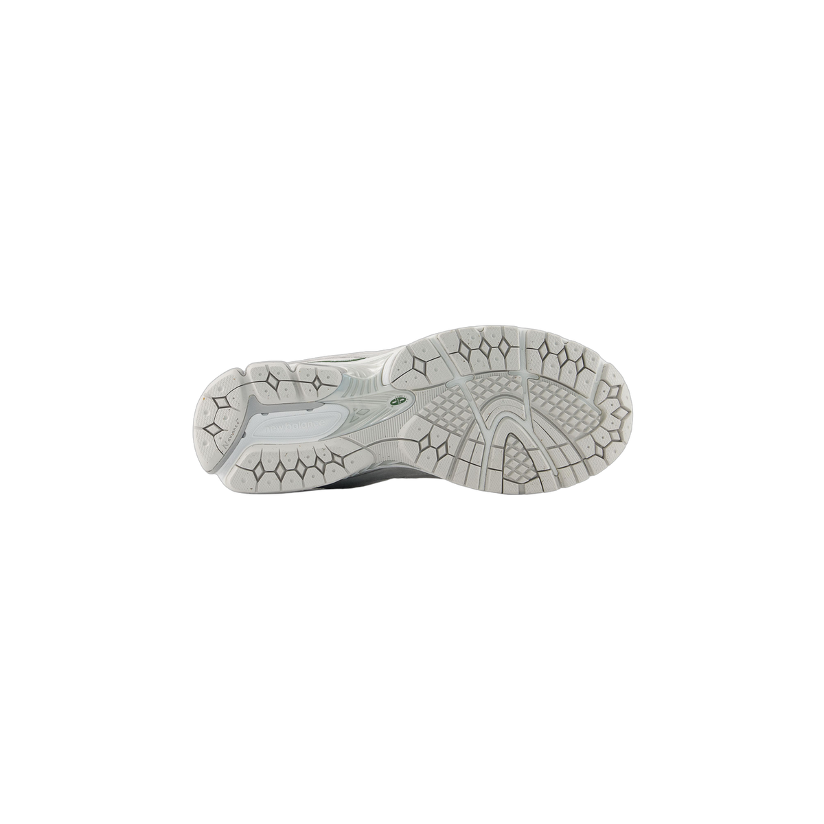 Bottom view of a single New Balance 2002R sneaker showing the white and gray diamond-patterned outsole tread with Ndurance branding