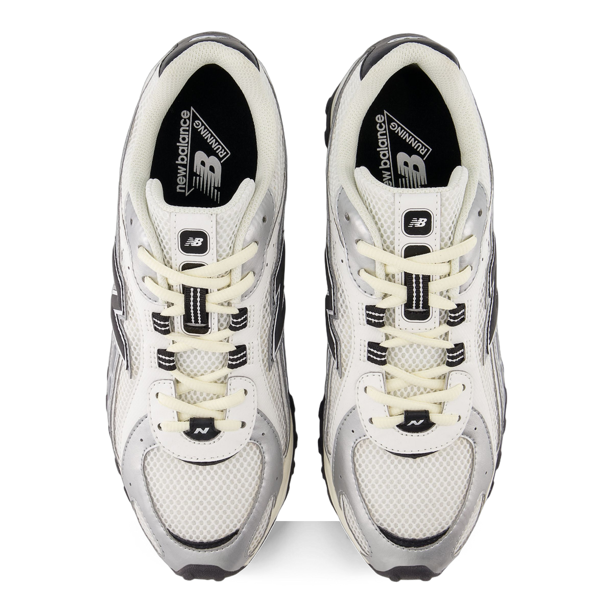 Top-down view of a pair of New Balance 204L sneakers in white mesh with silver metallic overlays, black heel and toe accents, and cream laces