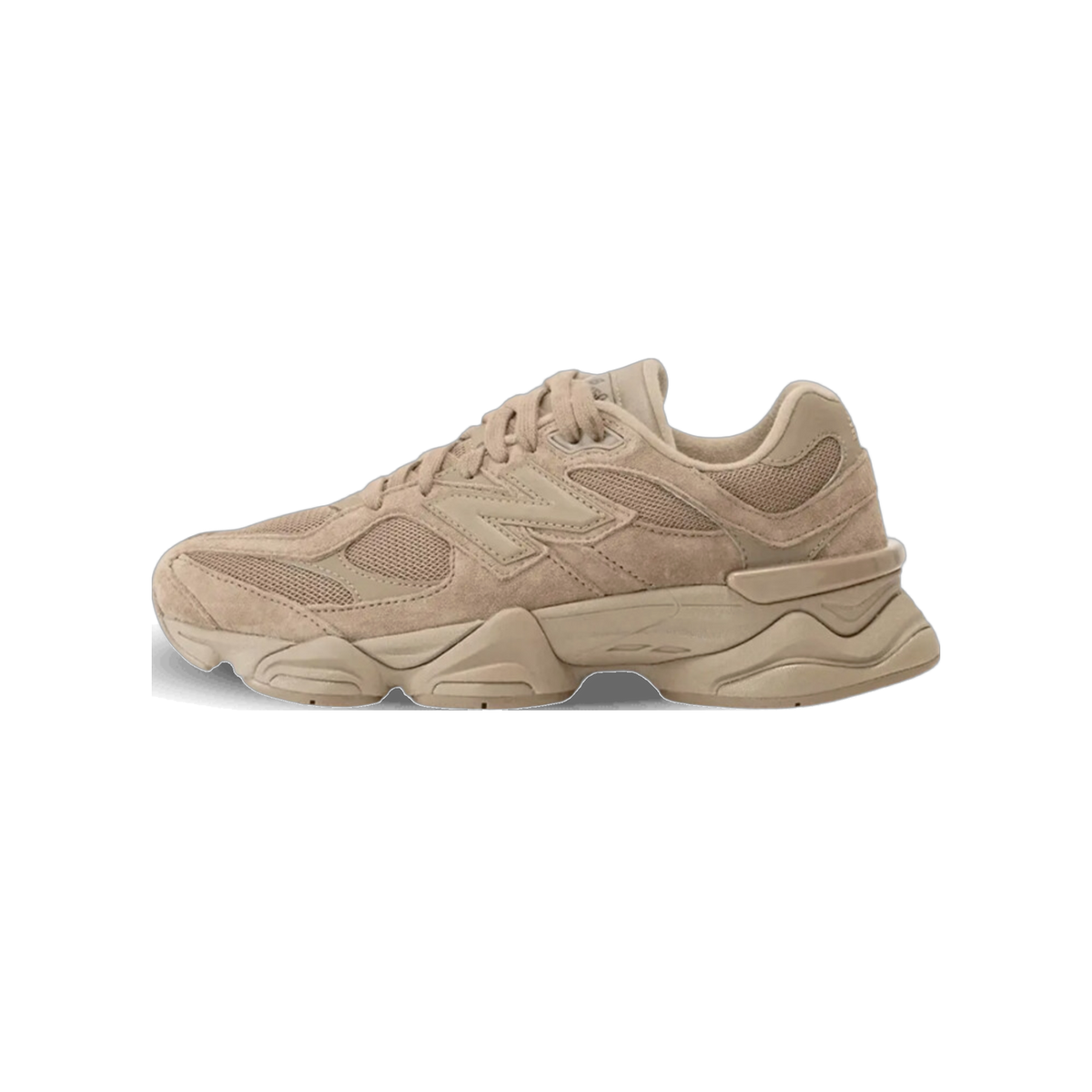Side view of a tan suede New Balance 9060 sneaker with the N logo facing left and a chunky layered midsole