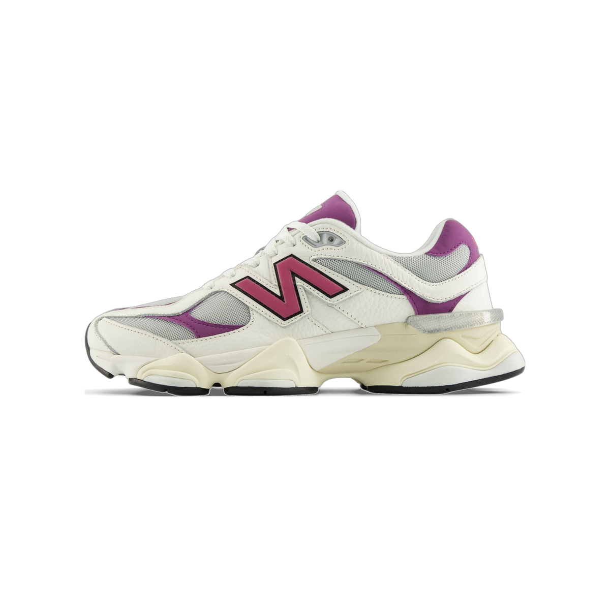 Side view of a white New Balance 9060 sneaker with pink N logo, purple heel and overlay accents, and a cream chunky sole, toe pointing left.