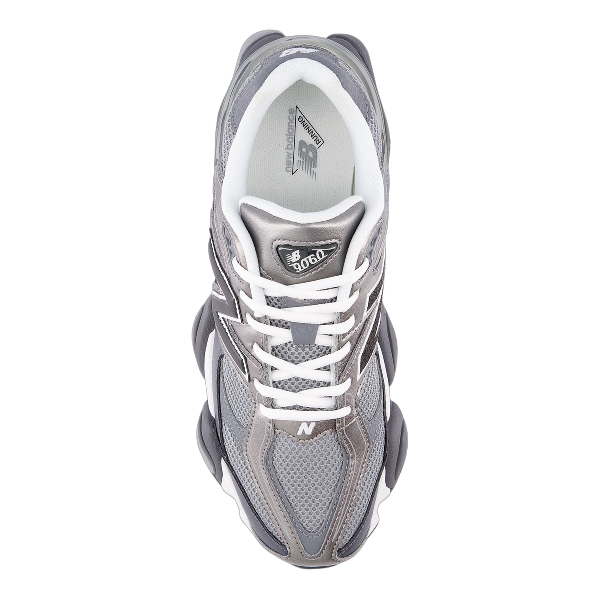 Top-down view of a gray and silver New Balance 9060 sneaker with white laces and visible 9060 logo on the tongue