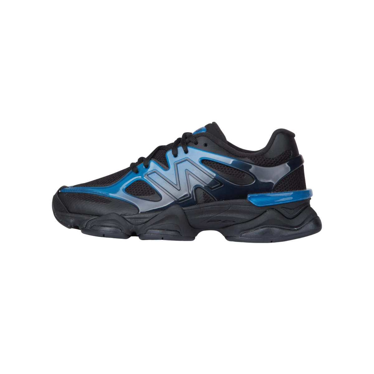 Side view of a black New Balance 9060 sneaker with a blue gradient N logo and chunky black outsole, toe pointing left.