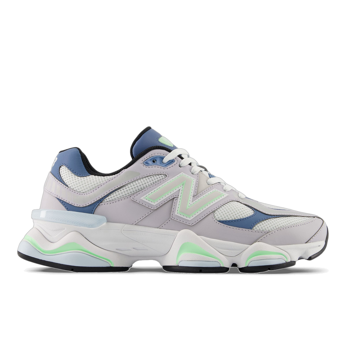 Side view of a gray New Balance 9060 sneaker with blue overlays, mint green accents, and a chunky white midsole, toe pointing left showing the N logo