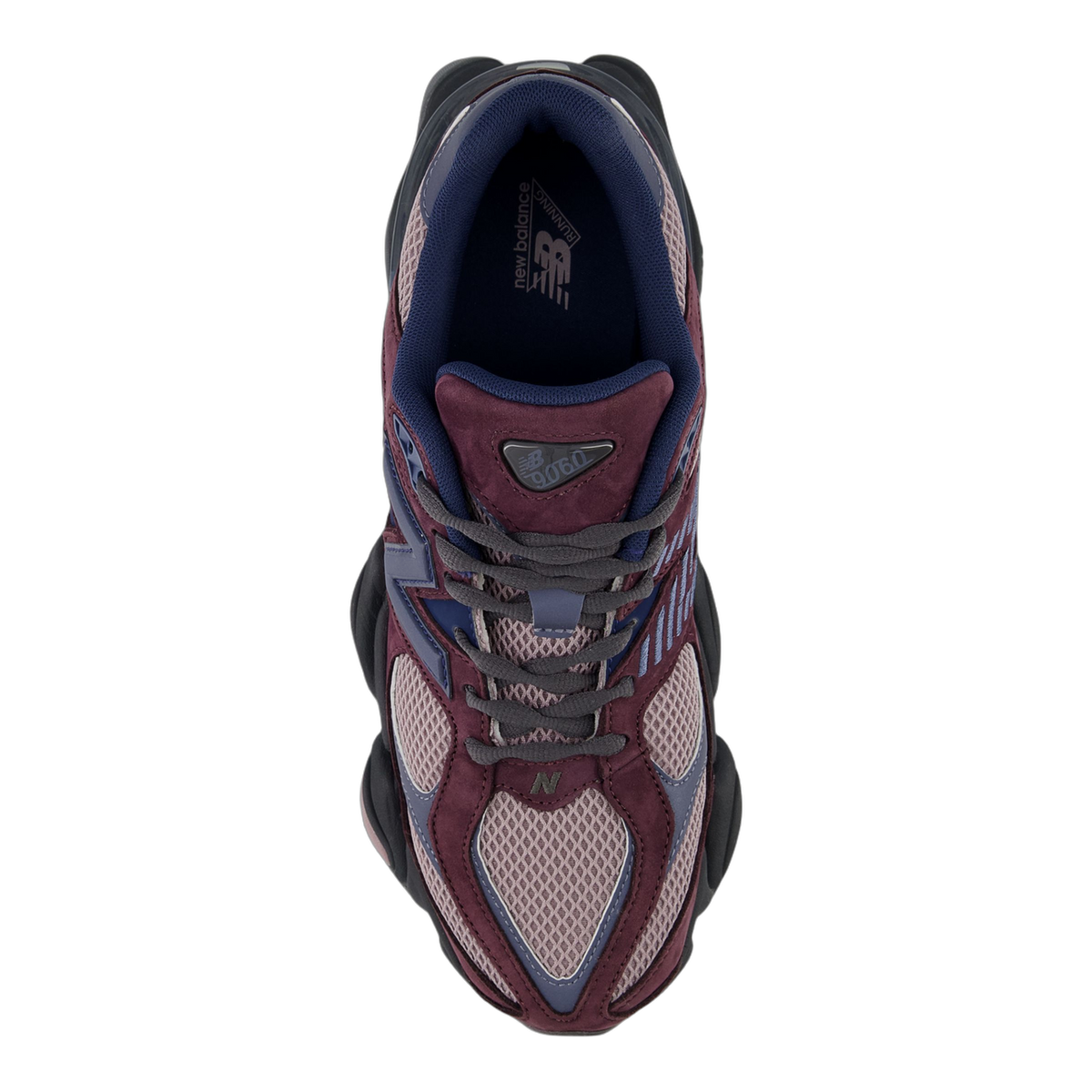 Top-down view of a New Balance 9060 sneaker in burgundy, mauve, and navy with a 9060 logo tab on the tongue and navy laces