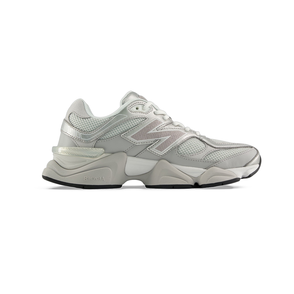 Side view of a light gray New Balance 9060 sneaker with mesh panels, a gray N logo, and a chunky white and gray ABZORB midsole with black outsole.