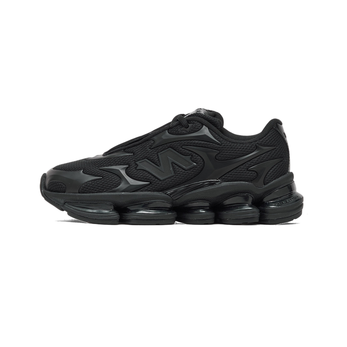 Side view of a black New Balance Abzorb 2000 sneaker with toe pointing left, featuring sculpted overlay panels, a mesh upper, and a ridged segmented midsole.