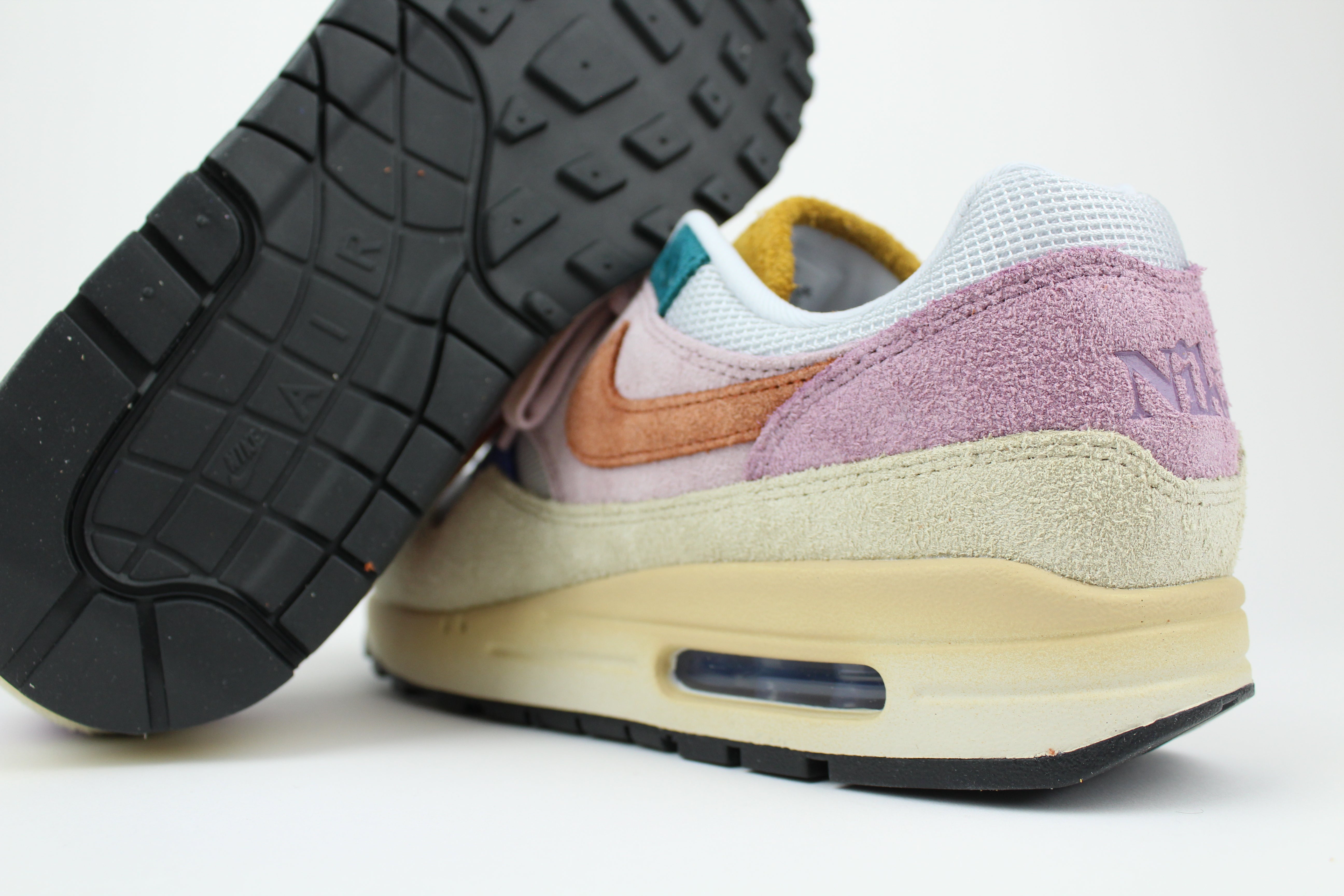 Nike Air Max 1 ’87 Premium “Tan Lines” with patchwork suede panels in Plum Fog and Burnt Sunrise. December 2023 release. Shop now!