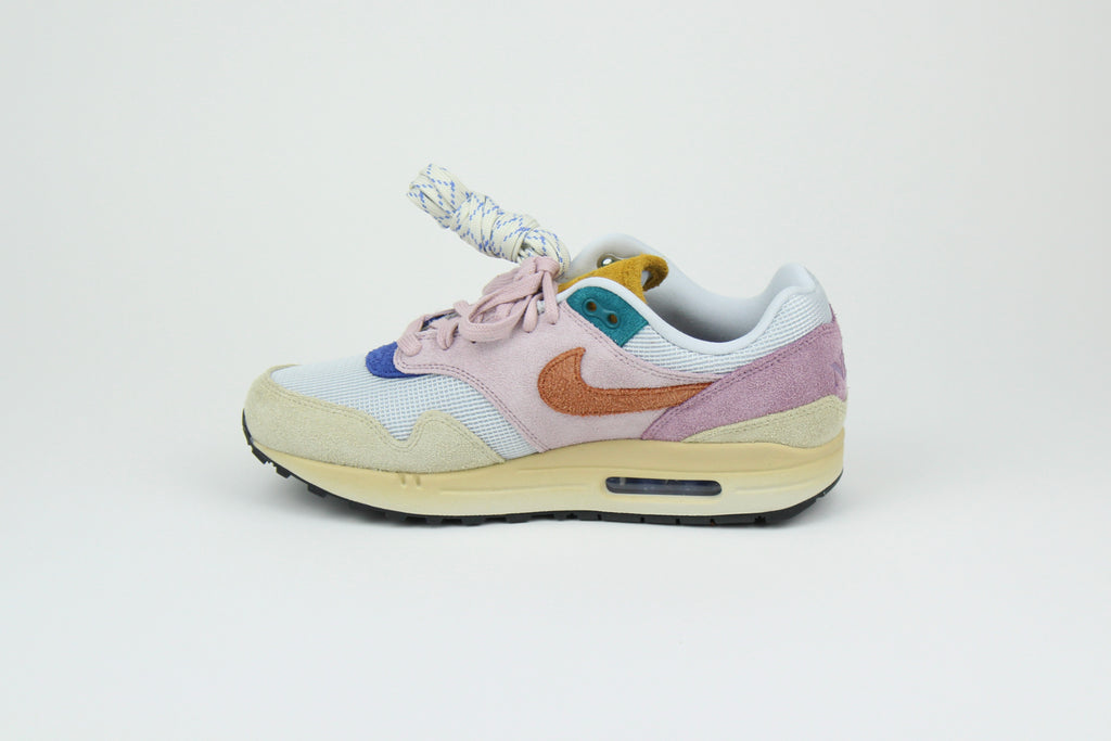 Nike Air Max 1 ’87 Premium “Tan Lines” with patchwork suede panels in Plum Fog and Burnt Sunrise. December 2023 release. Shop now!