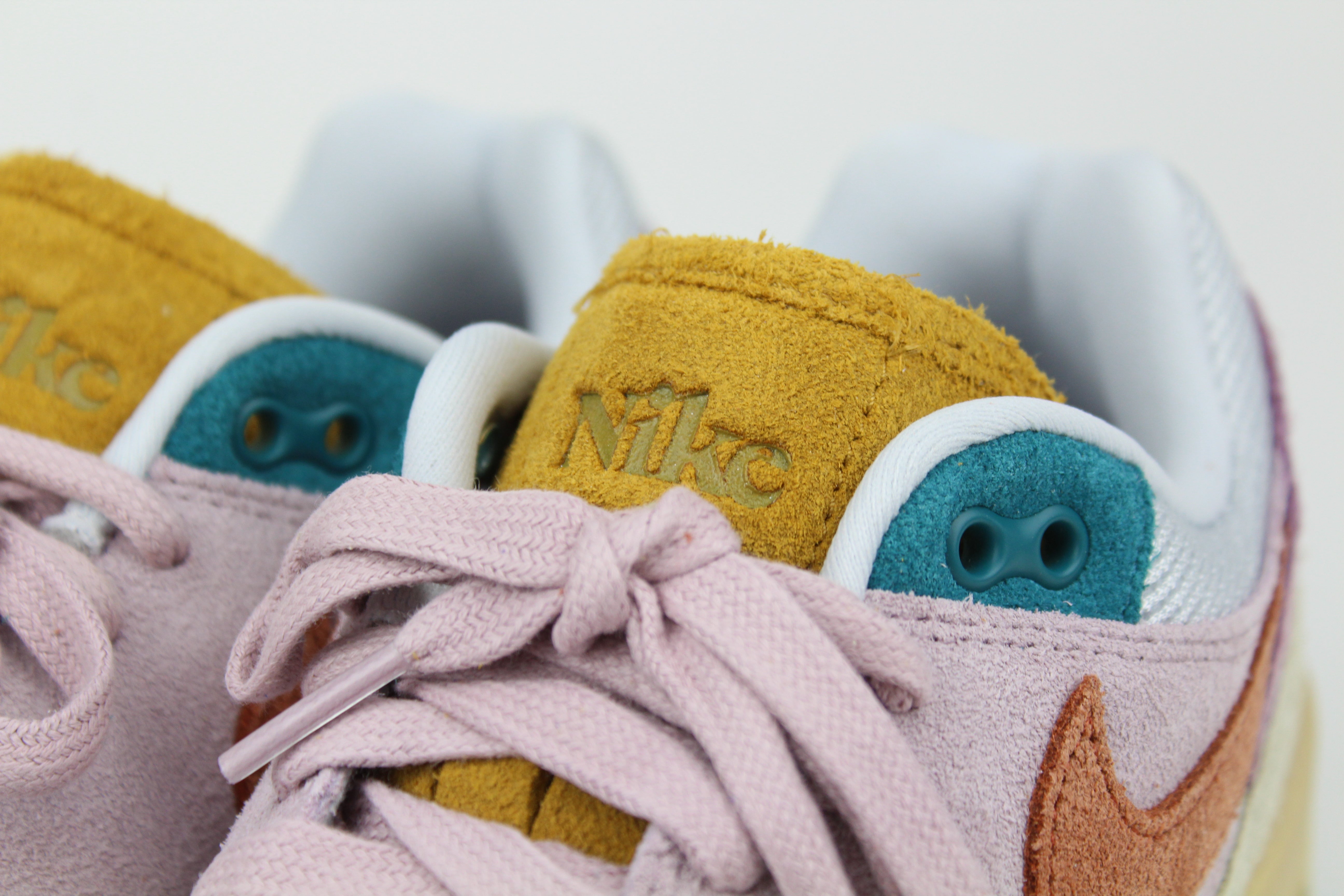 Nike Air Max 1 ’87 Premium “Tan Lines” with patchwork suede panels in Plum Fog and Burnt Sunrise. December 2023 release. Shop now!