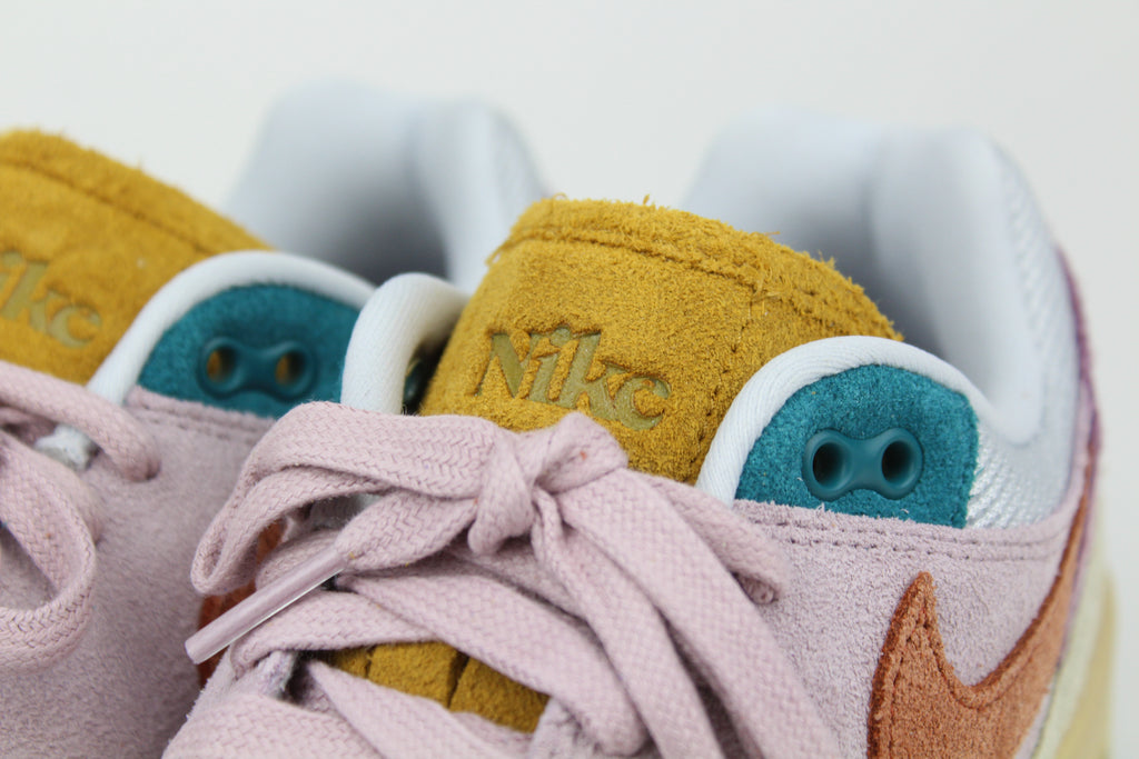 Nike Air Max 1 ’87 Premium “Tan Lines” with patchwork suede panels in Plum Fog and Burnt Sunrise. December 2023 release. Shop now!