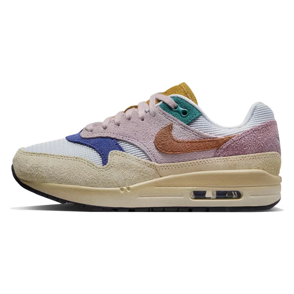 Nike Air Max 1 ’87 Premium “Tan Lines” with patchwork suede panels in Plum Fog and Burnt Sunrise. December 2023 release. Shop now!
