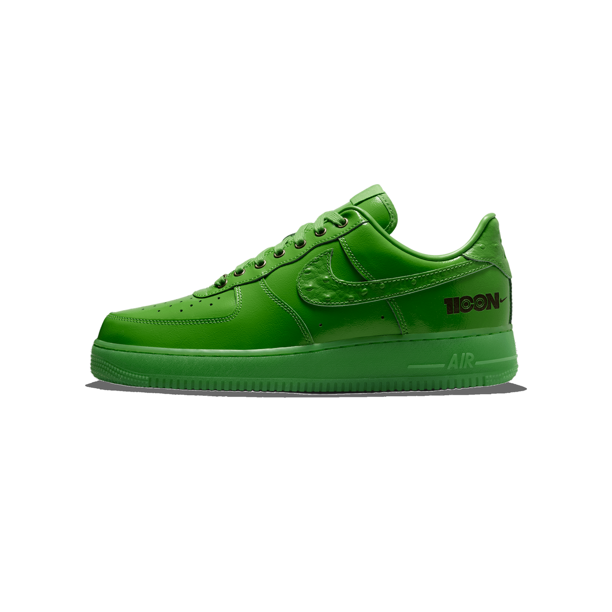 Lateral view of a green Nike Air Force 1 Low sneaker with a textured swoosh and 'ICON' text on the heel, toe pointing left.