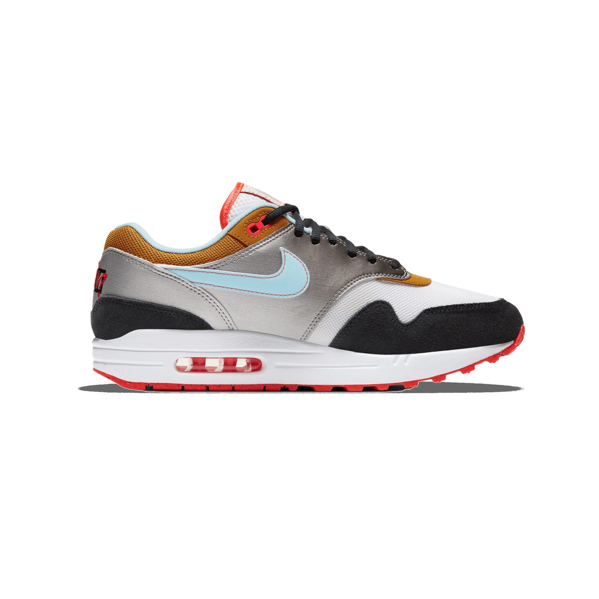 Side profile of a single Nike Air Max 1 sneaker with the toe pointing left, showing a white and black base, a grey gradient overlay, a light blue Swoosh, mustard-gold accents, red trim on the sole, and a visible red Air unit in the midsole.