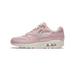 Side view of a pink Nike Air Max 1 sneaker with a translucent pink Jelly Swoosh, pale pink mesh and leather upper, and an off-white midsole showing a visible Air unit, with the toe pointing left.