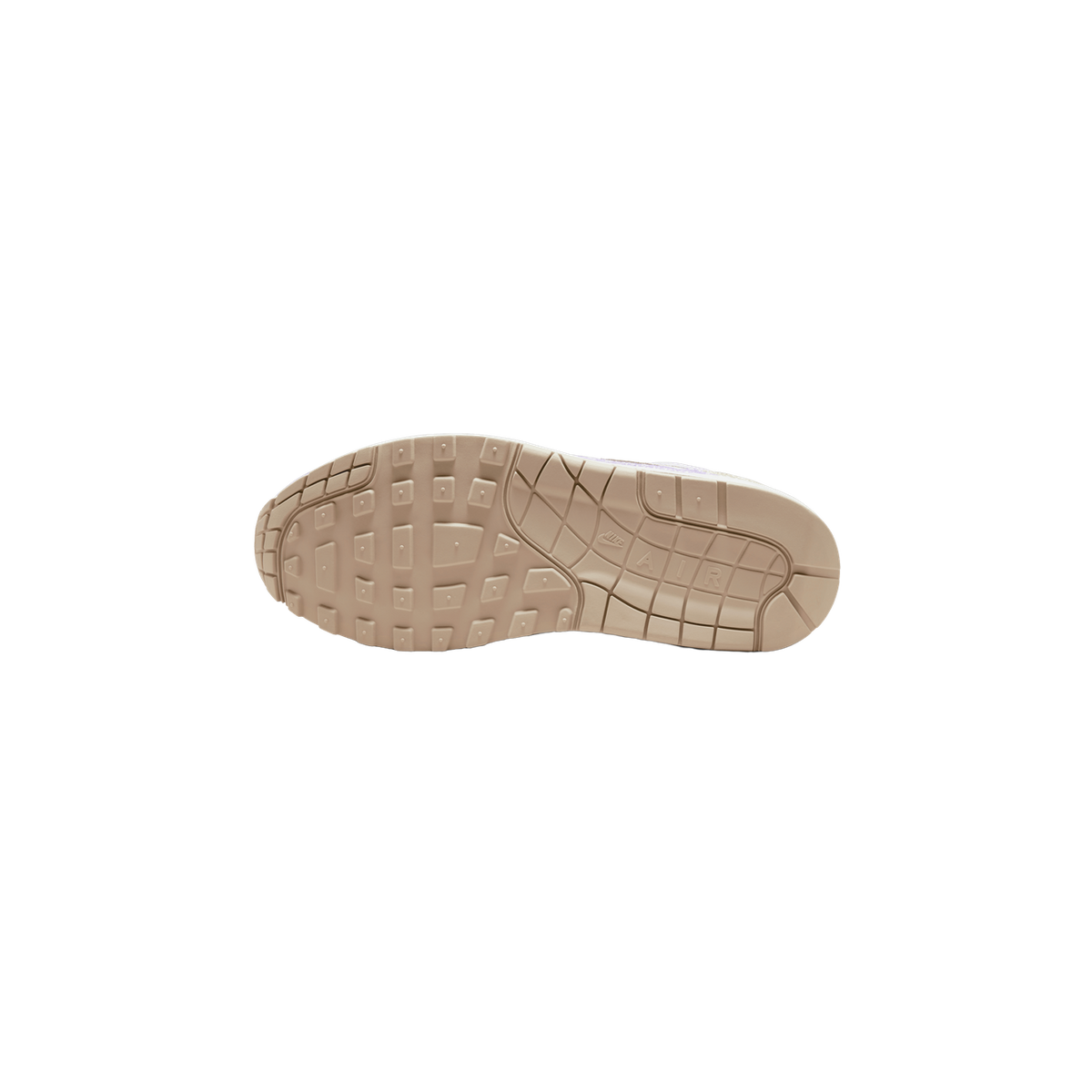 Bottom view of a tan rubber outsole with waffle tread pattern and Nike Air branding on a single sneaker