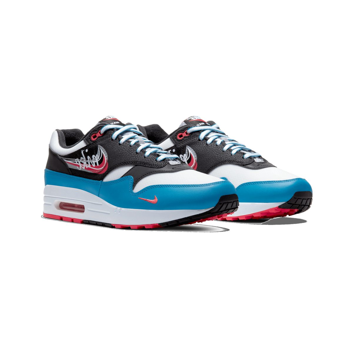 Pair of Nike Air Max 1 sneakers viewed from the front three-quarter angle, angled toward the left, with black, white, and bright blue panels, red accents, and a visible red Air unit in the midsole.