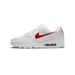 Side view of a white Nike Air Max 90 sneaker with a red Swoosh logo, red visible Air unit at the heel, and the toe pointing left.