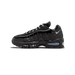 Side profile of a black patent leather Nike Air Max 95 sneaker with the toe pointing left, showing the white Swoosh logo on the midfoot, visible Air units in the sole, and black mesh and patent overlays.