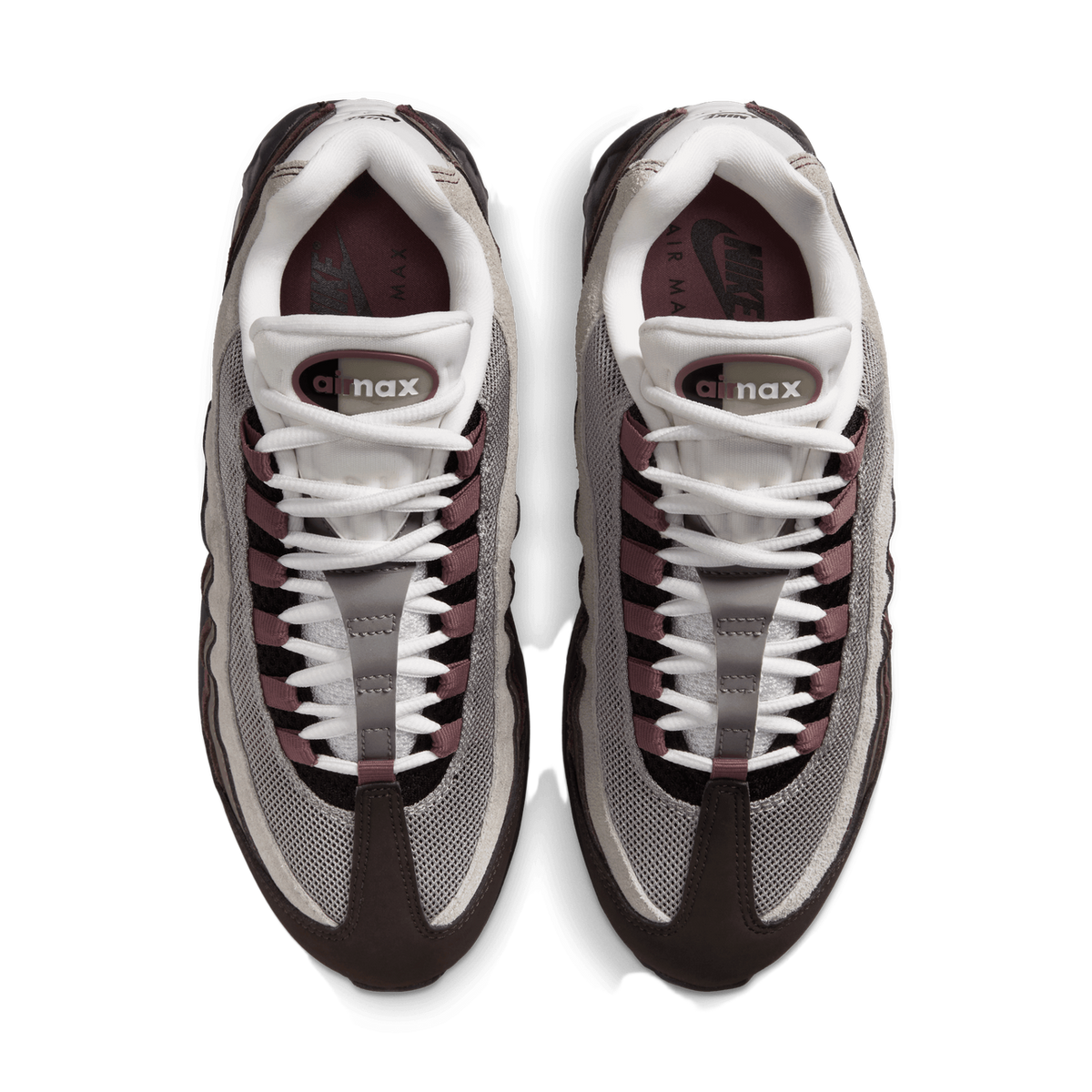 Top-down view of a pair of Nike Air Max 95 sneakers in grey, dark brown, and mauve with white laces and ribbed side panels