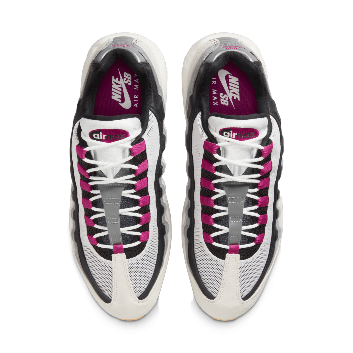 Top-down view of a pair of Nike Air Max 95 SB sneakers in white, black and pink with magenta Nike SB branded insoles and pink lace loops.