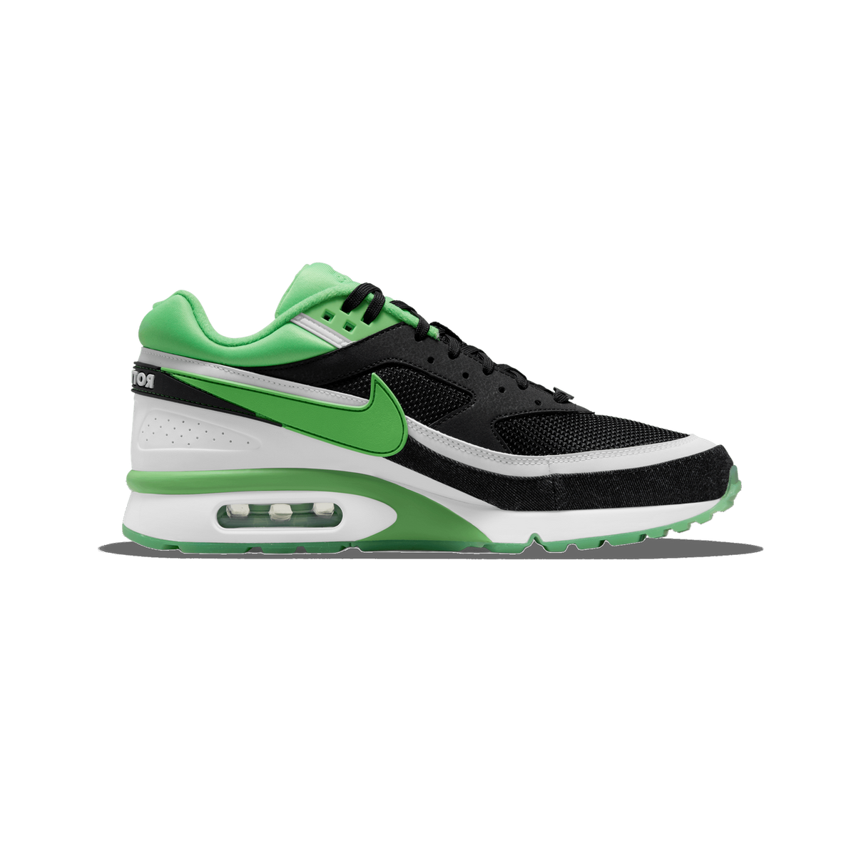 Side view of a black Nike Air Max BW sneaker with green Swoosh, green heel panel, white midsole, and visible air cushioning unit in the sole