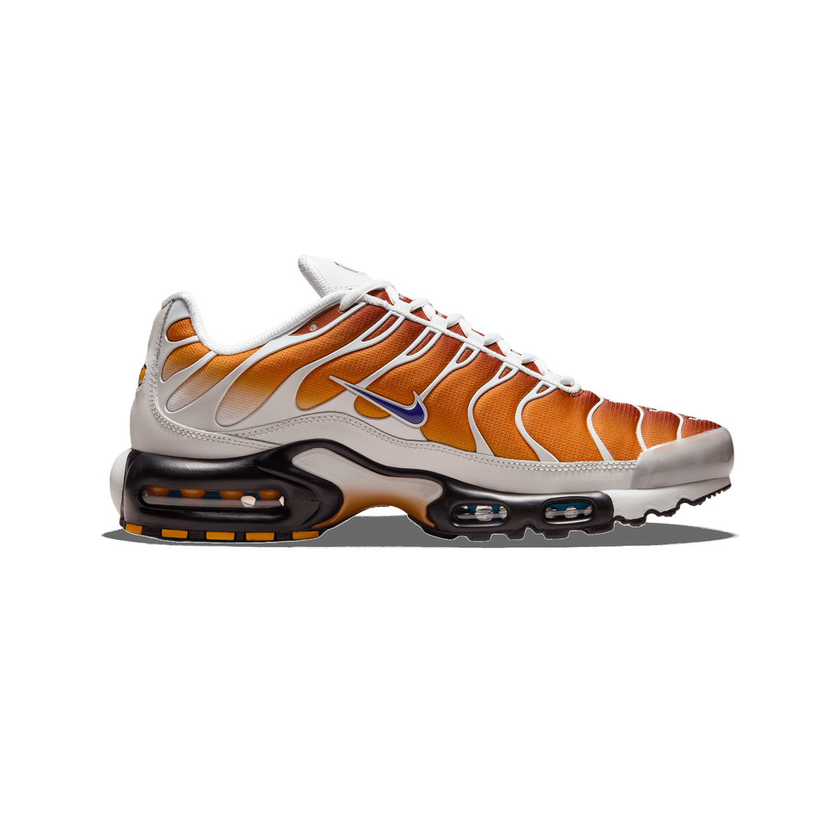 Side profile of a Nike Air Max Plus sneaker with the toe pointing left, showing an orange-to-brown gradient mesh upper, white TPU overlays, a purple Swoosh logo, and black and orange Air units along the sole.