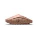 Side view of a tan Nike Mind 001 slip-on slide with perforated upper and small Swoosh logo, toe pointing left