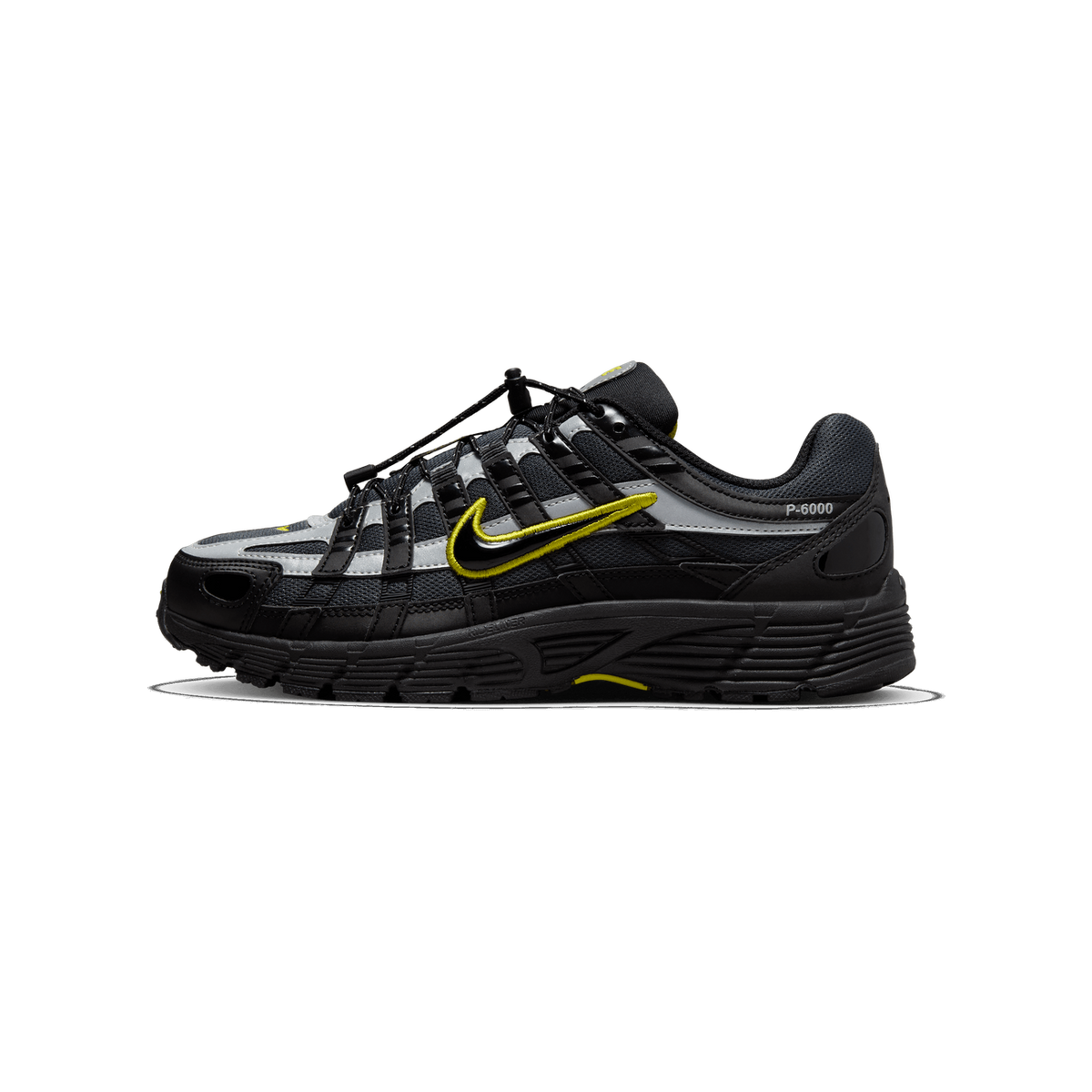 Side profile of a black and grey Nike P-6000 sneaker with a yellow embroidered Swoosh and P-6000 text on the heel, shown with the toe pointing left and the outer side facing the viewer.
