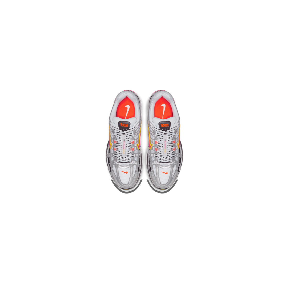 Top-down view of a pair of Nike P-6000 sneakers in white, silver and pink with bright orange tongue lining and Nike branding, laced with black and white laces.