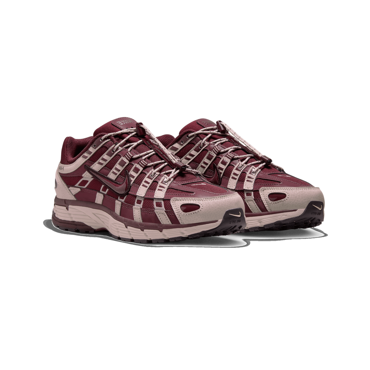 A pair of burgundy and taupe Nike P-6000 sneakers shown side by side at an angle on a white background, with burgundy mesh uppers, taupe overlays, and taupe midsoles.