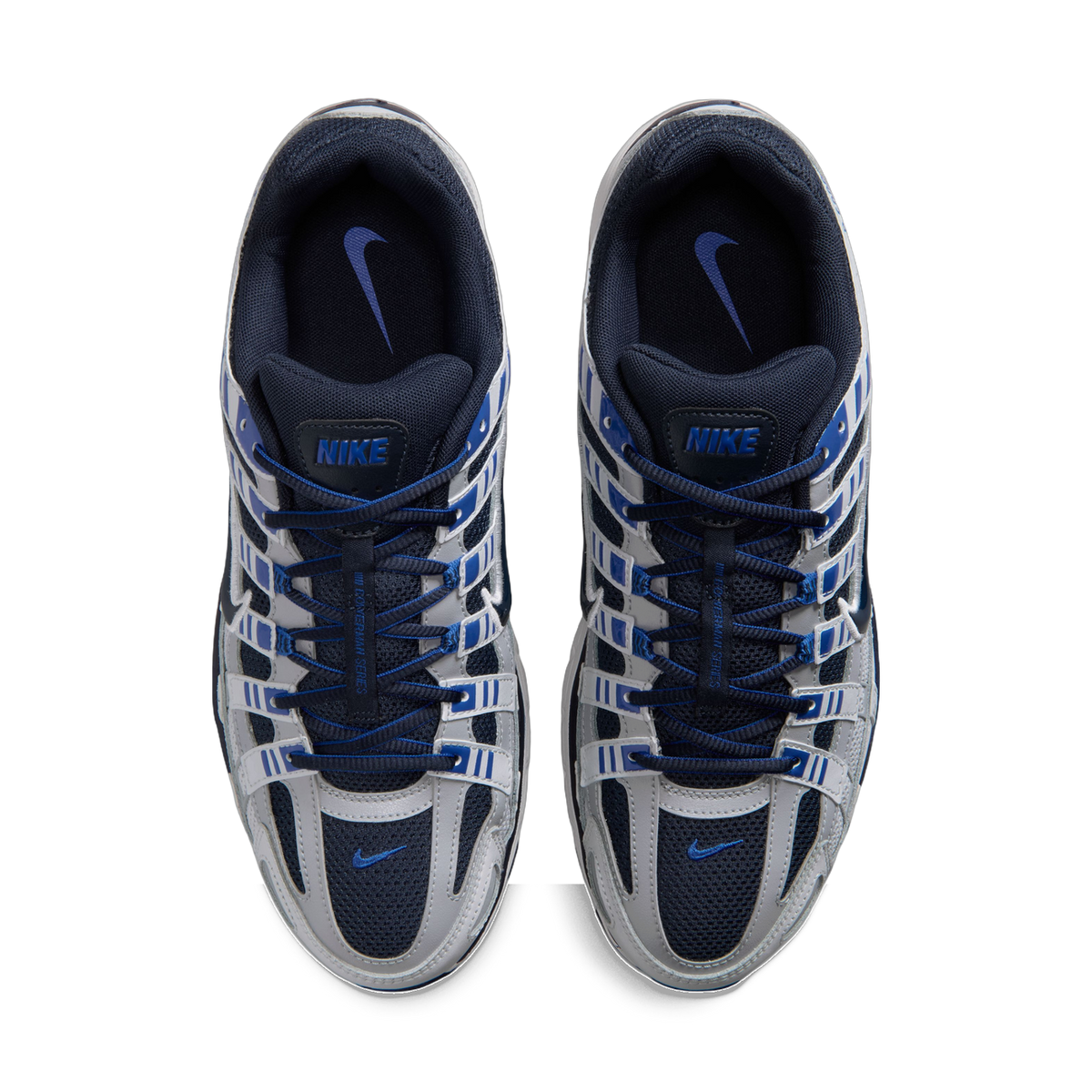 Top-down view of a pair of Nike P-6000 sneakers in gray, navy, and blue with navy laces and mesh tongue.