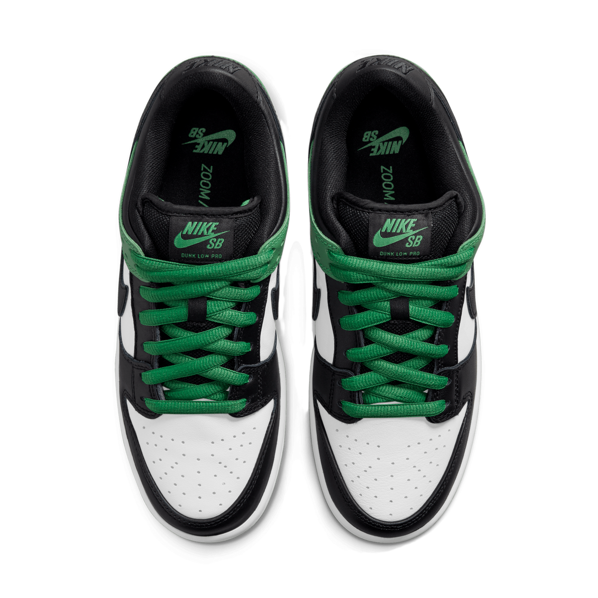 Top-down view of a pair of black, white, and green Nike SB Dunk Low Pro sneakers with green laces and matching ankle collars facing toward each other